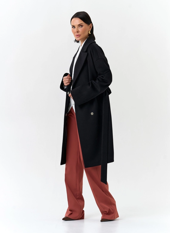 Женское пальто черного цвета фото