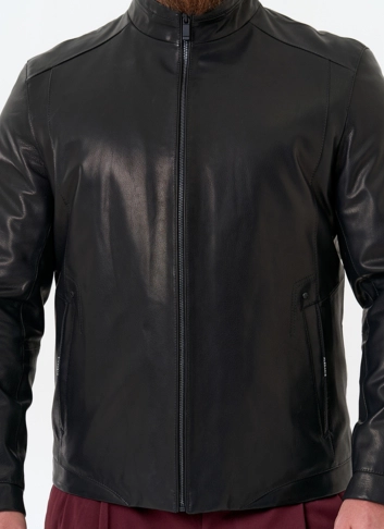 Мужская куртка из натуральной кожи черного цвета фото
